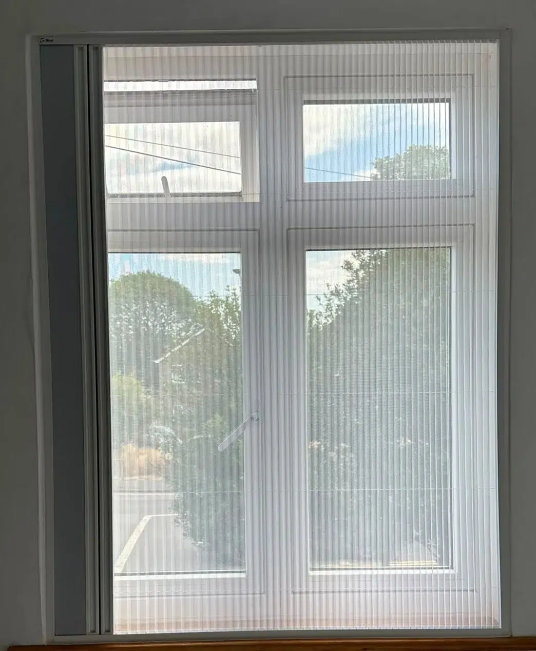 BlindScreen flyscreen closed across a window