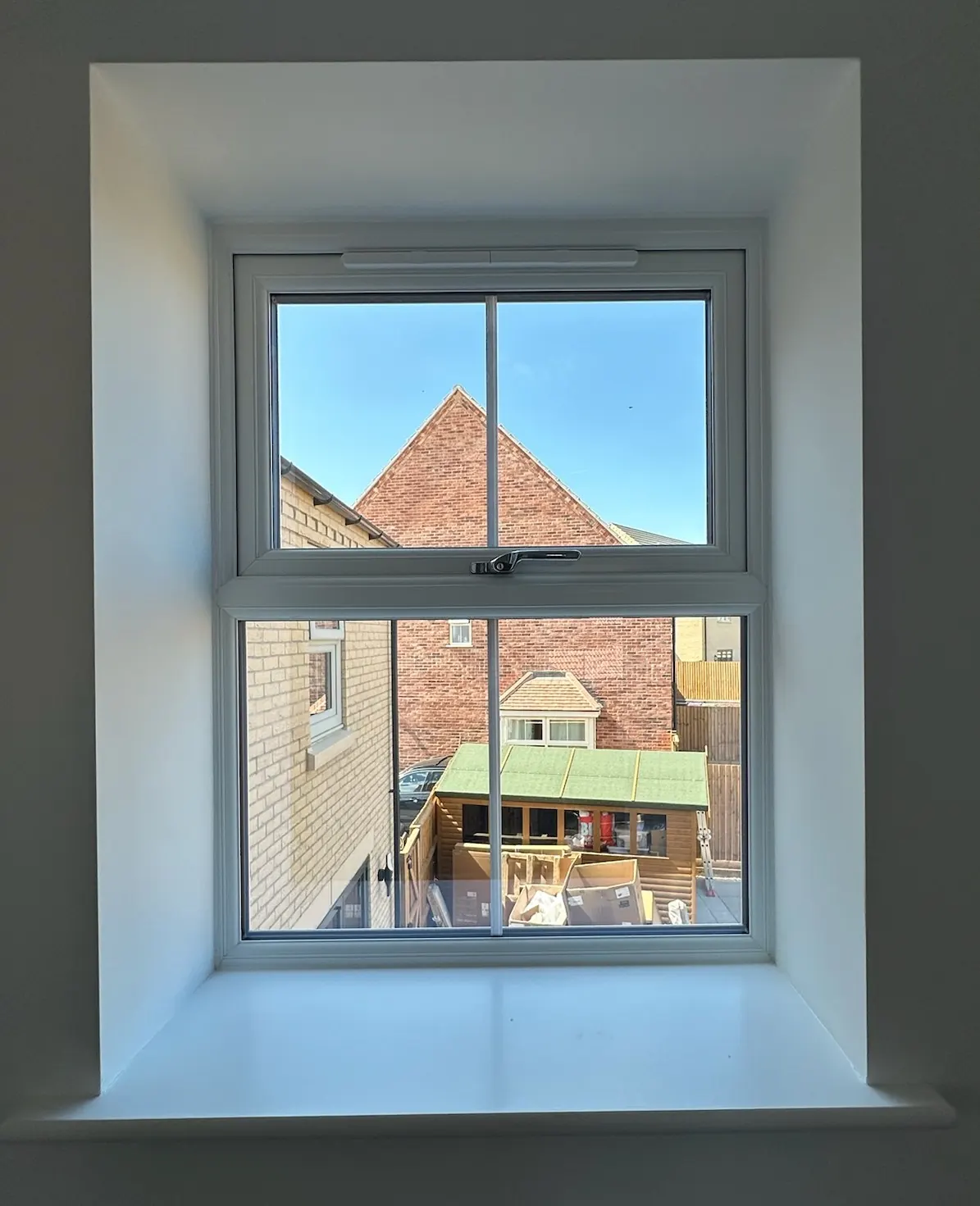 An undressed recessed new-build window before blinds were fitted