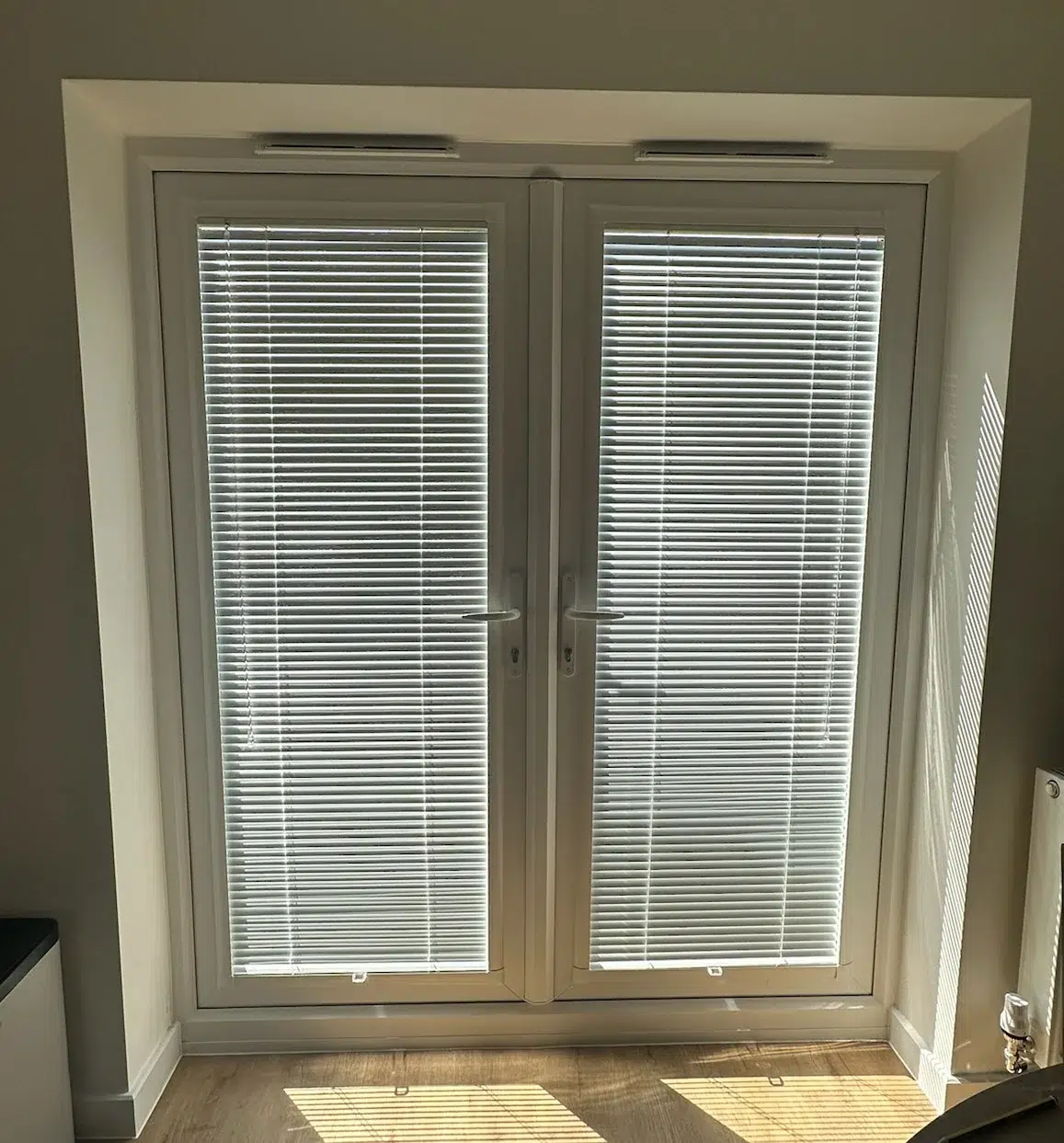 Perfect Fit Venetian blinds fitted to patio doors in a new build home