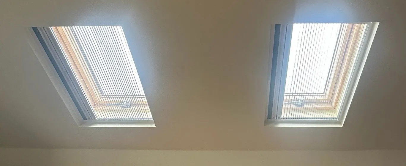 BlindScreen installed in a skylight with the flyscreen open