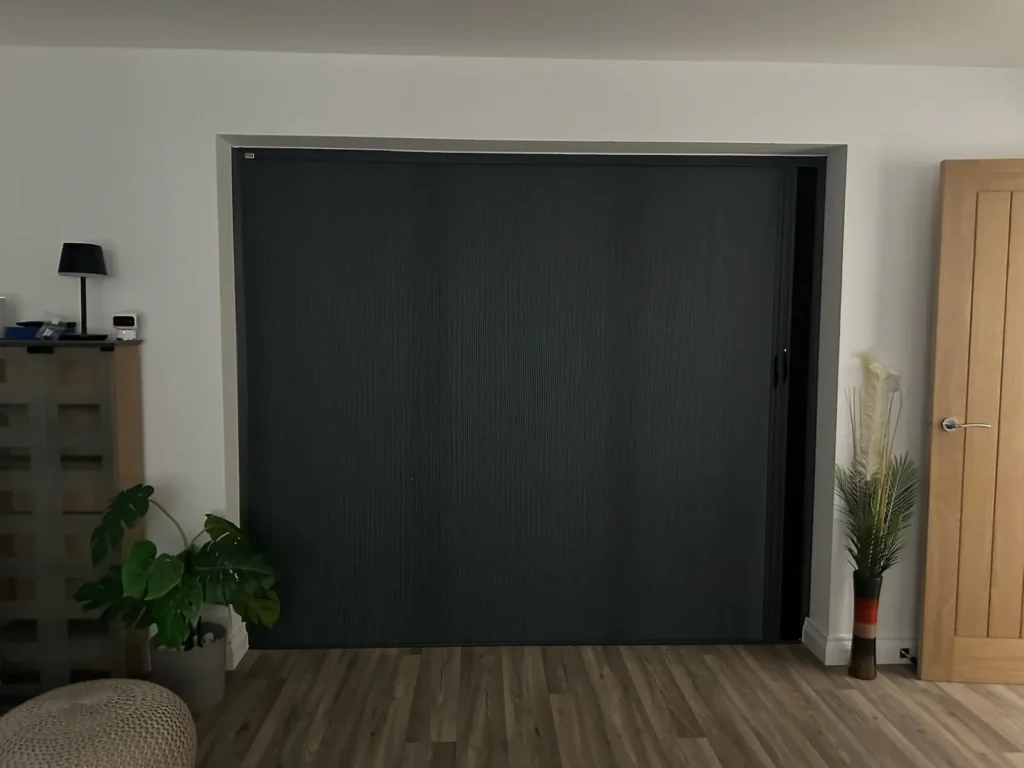 Blind Screen fully closed across the same bifold doors, seen from inside