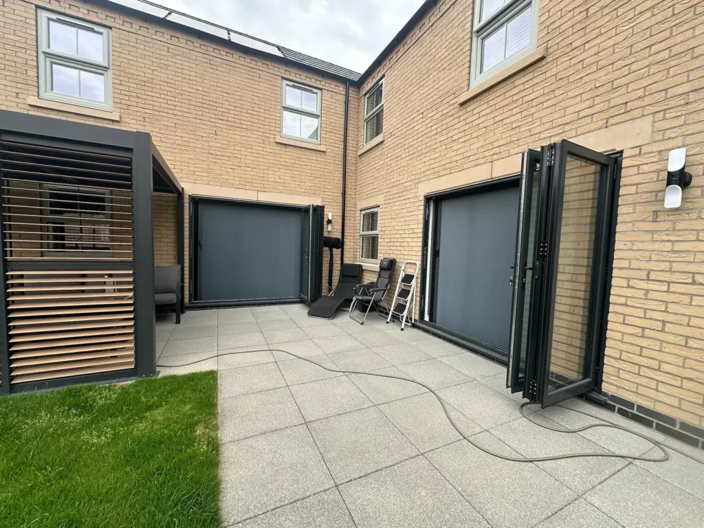 New-build bifold doors fitted with Blind Screen, seen from the garden